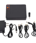 Mini UPS 15600mAh Battery Backup For Router And Modem USA Plug with charger and cables arranged neatly.
