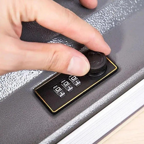 Close-up of a hand using the smooth turntable code dial on a keyless mechanical combination lock for cabinets and drawers.