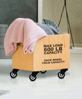 Wooden storage box with pink blanket on 12 Pack Swivel 2 Inch Caster Wheels With Rubber Base Top Plate And Dual Ball Bearings