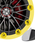 Premium 4 Piece 56Mm Wheel Hub Center Cap Stickers For Rims featuring sleek gray design on sporty wheel.