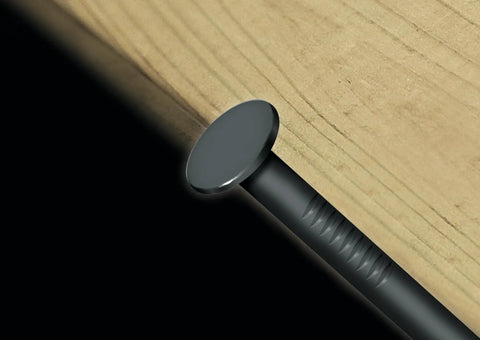 Close-up of a Bright Steel Framing Nail 14 Gauge Half Inch Wood Fastener embedded in wood surface, ideal for carpentry.