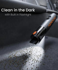 Heavy Duty Cordless Car Vacuum With 16000Pa Kickass Suction And HEPA Filter Handheld Detailer With Led Display Plus Dual Vacuum Blower Modes For Slick Auto Whip Cleanup cleaning with flashlight on dark car carpet.