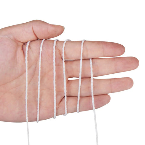 Close-up of hand holding White Cotton Butchers Twine Heavy Duty 2mm Thick String 656 Feet Food Grade Kitchen Baker String