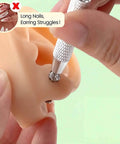 Close-up of Piercing Taper Ball Grabber Tool Kit being used on dummy ear for jewelry swap.