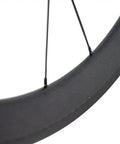 Close-up of Pro Grade 700C Carbon Clincher Front Wheel for Road Bikes Ride Ready Ultralight Full Carbon Fiber EN Quality