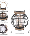 Battery Powered Metal Cage LED Lantern 7.3 Inch Tall Cordless Accent Light With 20 Fairy Lights Perfect For Weddings Parties Patio Indoors Outdoors Ideal For Indoor Outdoor Decor with handle detail close-up.