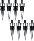 Eight-piece wine bottle stopper set, stainless steel with black ribbed grip.