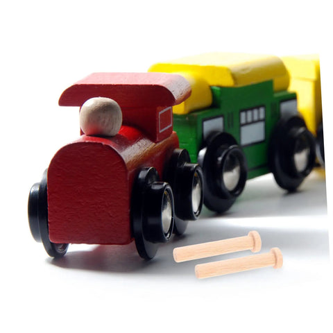 Solid Wood 20 Piece Miniature Nails Set For Crafts And Model Building shown with toy train wheels