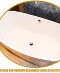 Universal Bathtub Drain Stopper Press Plug with Copper Core installed in a modern white bathtub, showing sleek design and functionality.