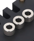 Dead On Precision Self Centering Doweling Jig Kit With Spot On Drill Guide Locator showing three steel guide pins on black base.