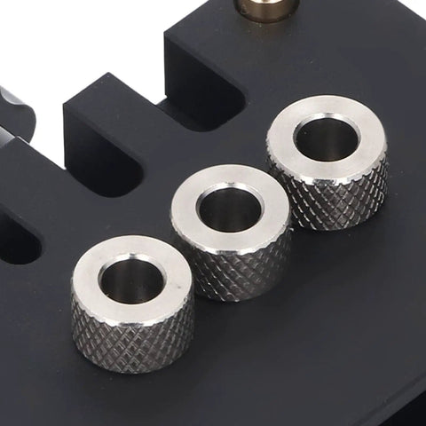 Dead On Precision Self Centering Doweling Jig Kit With Spot On Drill Guide Locator showing three steel guide pins on black base.