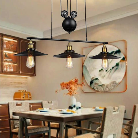 Fresh Vintage Industrial Billiard Chandelier Features Easily Adjustable Pulley Lift System In Classic Black Metal Three Light Ceiling Hanging Lamp Solid Pick For Dining Room Or Chill Loft displayed above a dining table.