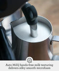 Auto milk frothing wand in stainless steel pitcher for smooth microfoam with Super Solid Game Changer All In One Espresso Machine With Built In Grinder And Smooth Touch Panel For Quick Beans To Cup Brews In Stylish Brushed Stainless Steel Certified Remanufactured Setup.