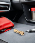 Dent Repair Welder Collet For Welder Gun Replacement Locking Chuck Head with reliable clamping on grey surface in car interior.