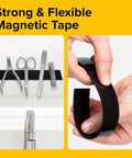 Magnetic Tape With Adhesive Backing 10 Feet Long By Half Inch Wide displayed holding scissors and rolled in hand