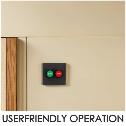 Industrial 2 Button Control Station With Emergency Stop And Start Push Buttons For Workshop Motor And Fan Control, Plastic Surface Mount Switch Panel For Reliable Shutdown And Easy Maintenance. surface-mounted black panel with green START and red STOP buttons on wall
