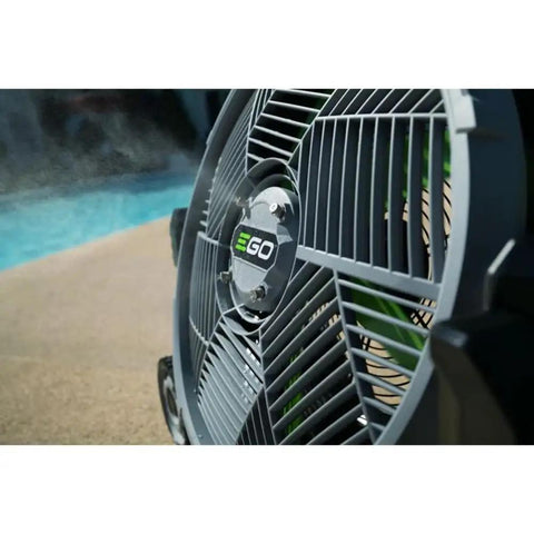 Close-up of Go To Outdoor Mist Cooling Fan With 18 Inch Blade, 5 Speed Settings, Delivers Up To 5,000 CFM by a poolside