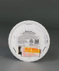 Back view of a carbon monoxide detector featuring reset button, battery label, and UL certification for household safety. Make Sure Your Loved Ones Stay Chill With This Rock Solid Interconnected Carbon Monoxide Detector Offering Legit UL Certification And Pain Free Mounting For Serious Household Safety.