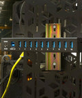 Industrial USB 3.0 Hub With 10 Ports, Heavy-Duty Metal Mountable Design, attached to industrial equipment, side view