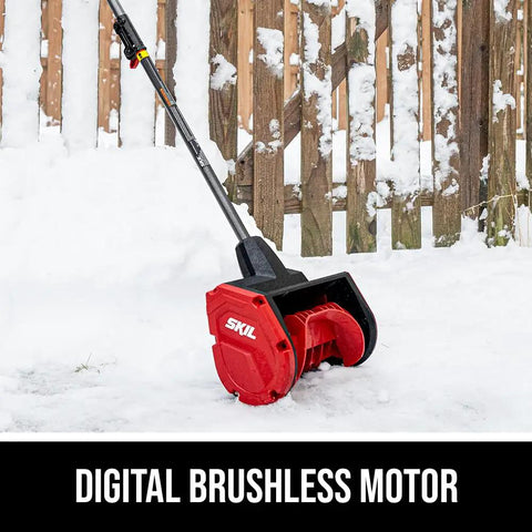Badass Brushless 40 Volt Cordless Snow Shovel Kit with 12 Inch deck in snow, featuring a digital brushless motor design.
