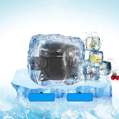 Compact Automatic Countertop Ice Maker Cranks Out Fresh Cubes In Eight Flat Minutes encased in ice, showcasing silent operation.
