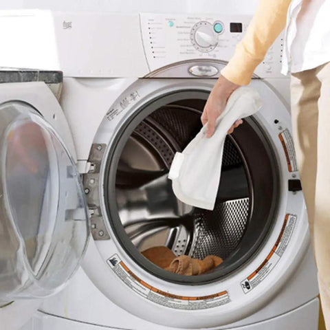 4 Pack Microfiber Scrubby Mop Pads For PowerFresh 1940 Steam Mop Replacement being placed in washing machine