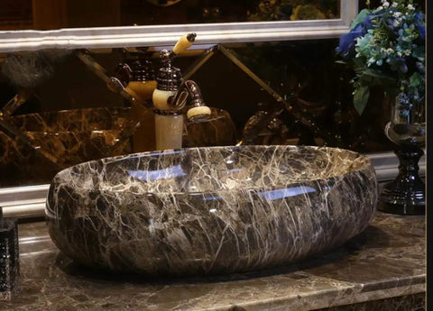 Modern Oval Vessel Sink for Countertop Bathroom Vanity, Heavy Duty Ceramic Wash Basin with Single Hole Faucet Setup, Sleek Art Porcelain Design close-up view of polished marble sink.