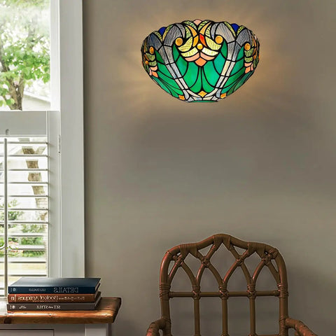 Soft Glow Tiffany Style Wall Sconce In Sea Green Stained Glass With One Light Vintage Victorian Ambience For Living Room Bedroom Hallway And Entryway Classic Cool Vibe For Cozy Homes, mounted on wall above chair