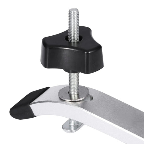 Close-up of No Nonsense Quick Acting T Track Hold Down Clamp Set For Woodworking with metal clamp showing quick-release mechanism.