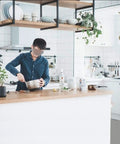 Solid Wood Ceiling Shelf Bracket With Iron Floating Shelf in kitchen, man cooking, visible plants and kitchenware, 60x30x60 cm