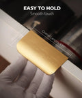 Five Pack Adhesive Edge Pulls for Cabinets no drill hidden drawer handles brushed gold finish shown installed on drawer