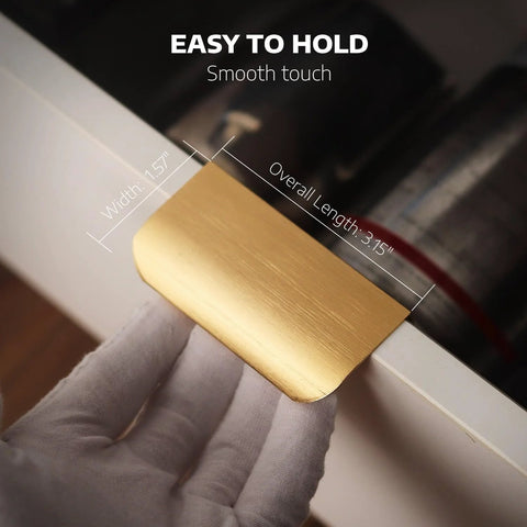 Five Pack Adhesive Edge Pulls for Cabinets no drill hidden drawer handles brushed gold finish shown installed on drawer