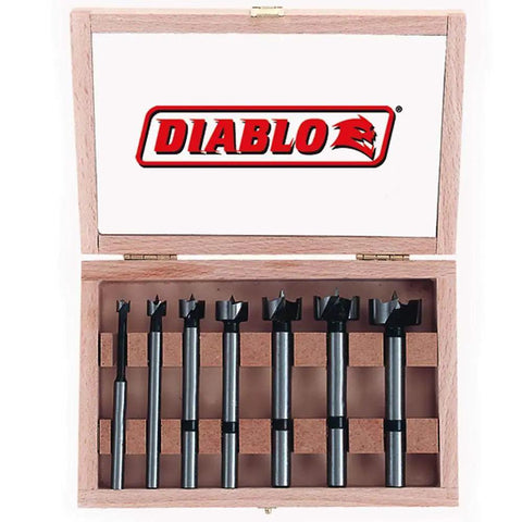 Wooden case with High Speed Steel Forstner Bit Drill Set For Precise Clean Holes In Any Wood Type Ideal For Pro Woodworking Projects One Quarter Inch To One Inch Diameter Bits With One Quarter To Three Eighths Inch Shank Three And A Half Inch Length Seven Piece Set.