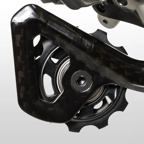Close-up of the pulley system on an XTR Di2 Rd M9050 Rear Derailleur Black Medium Cage for trail and mountain bikes.
