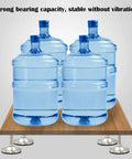 Heavy Duty Adjustable Furniture Leveling Feet Pair Thick Carbon Steel Threaded Base Stabilizer supporting large water bottles.