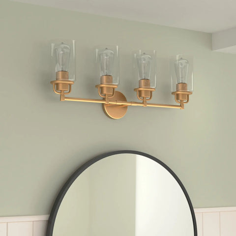 4 Light Vanity Light Wall Sconce In Champagne Bronze Finish With Clear Glass Lampshades, Gold Bathroom Fixture, mounted above mirror