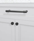 10 Pack Five Inch Matte Black Cabinet Handles Knurled Drawer Pulls For Cabinets Closets Drawers Dressers Doors And Kitchen Furniture Hardware installed on a white kitchen cabinet