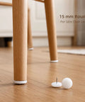 15mm round Nail-In Glides For Chairs And Tables 20 Pack with PP plastic and metal pin on wood floor