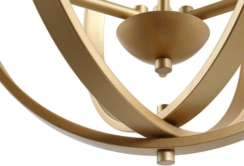Close-up of gold orb chandelier with openwork globe spheres, part of a modern 3 light fixture for dining room, bedroom, living room.