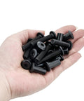 25 Piece M8x40mm Black Furniture Bolts And Cabinet Connector Screws With Barrel Nuts Kit held in a hand, showcasing heavy duty design.