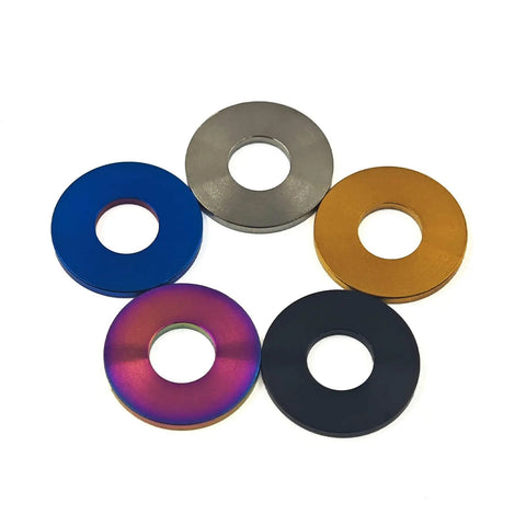 Premium Grade 5 Titanium Flat Washers For M5 M6 M8 M10 Bolts And Nuts in various colors and sizes arranged together.