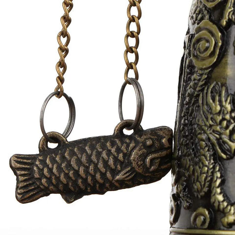 Vintage Bronze Dragon Lock Bell, Top Shelf Handcrafted Desktop Ornament With A Smooth Electroplate Finish, close-up of fish detail.