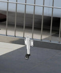 Top Shelf Premium Heavy Duty Gate Wheels With Spring Loaded Shock Absorption And Adjustable Height Casters For Smooth Rolling Metal Yard Gates Quick Install mounted on a metal gate, showcasing smooth functionality.