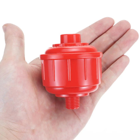Person holding a red filter from 10 Pack Disposable Mini Air Water Trap Filters With 1/4 Inch Threads For Spray Guns, Paint Sprayers, And Air Tools That Stop Moisture