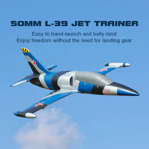 RC Arrows 50mm L39 RC Plane With Vector Flight Stabilization System PNP Blue flying against clear sky background.