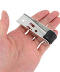 Top Notch 4 Piece Sliding Door Rollers With Slippery Smooth Track Pulleys For Wardrobe And Closet Sets Featuring Quick Swap 4 Hole Mount And Dead Silent Furniture Casters in hand, showing silver metal and black roller.