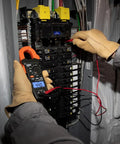 Clamp Meter Electrical Test Kit With Auto Ranging, Measures AC Current Up To 400 Amps, Backlit Display, in use on panel