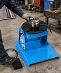 Boss Level Rotary Welding Positioner With Variable Speed Foot Switch And Zero To Ninety Degree Tilt Table For Smooth Pipe Fabrication Work 10Kg Capacity in workshop setting.