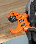 Lightweight PEX Pipe And Tubing Cutter With Soft Molded Handles And Pierce Point Blade for clean PEX cuts, orange tool in hand