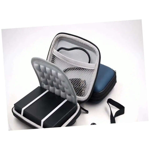 Built Different Travel Tech Bag For Power Bank Protection And Digital Accessory Organizing With Heavy Duty Zipper Closure, open view showing organized tech items.